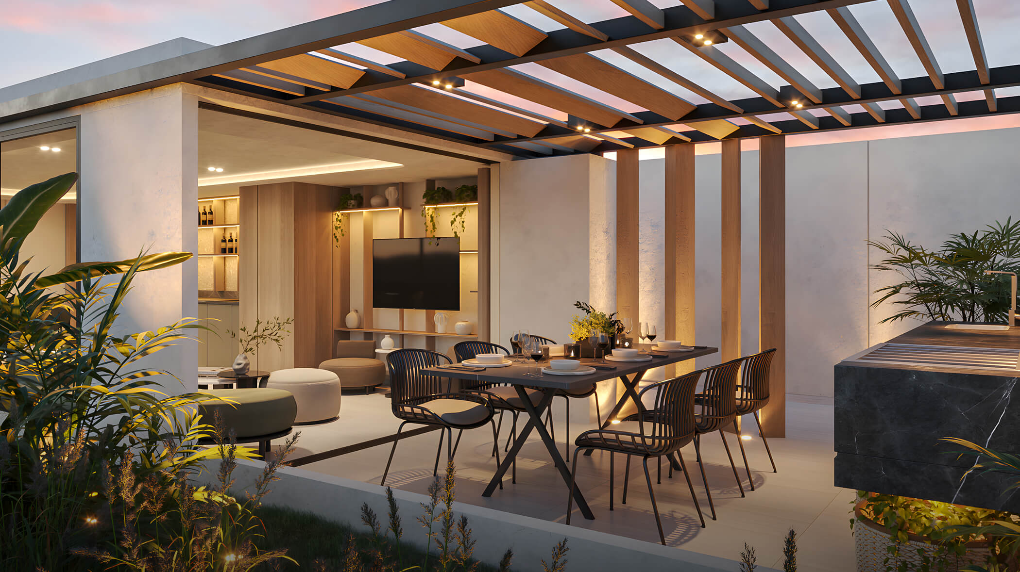 Zona de parrillas del proyecto Aster Costanera en San Miguel de Aster Homes con comedor exterior, pérgola iluminada y ambiente social.