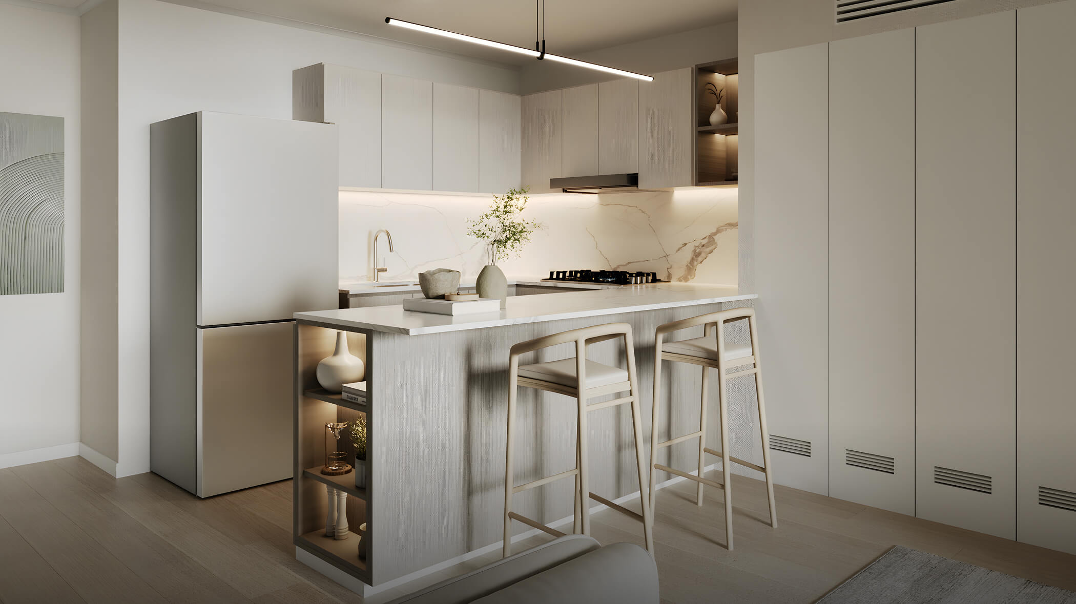 Cocina del proyecto Aster Costanera en San Miguel de Aster Homes con barra funcional, mobiliario moderno y iluminación cálida.