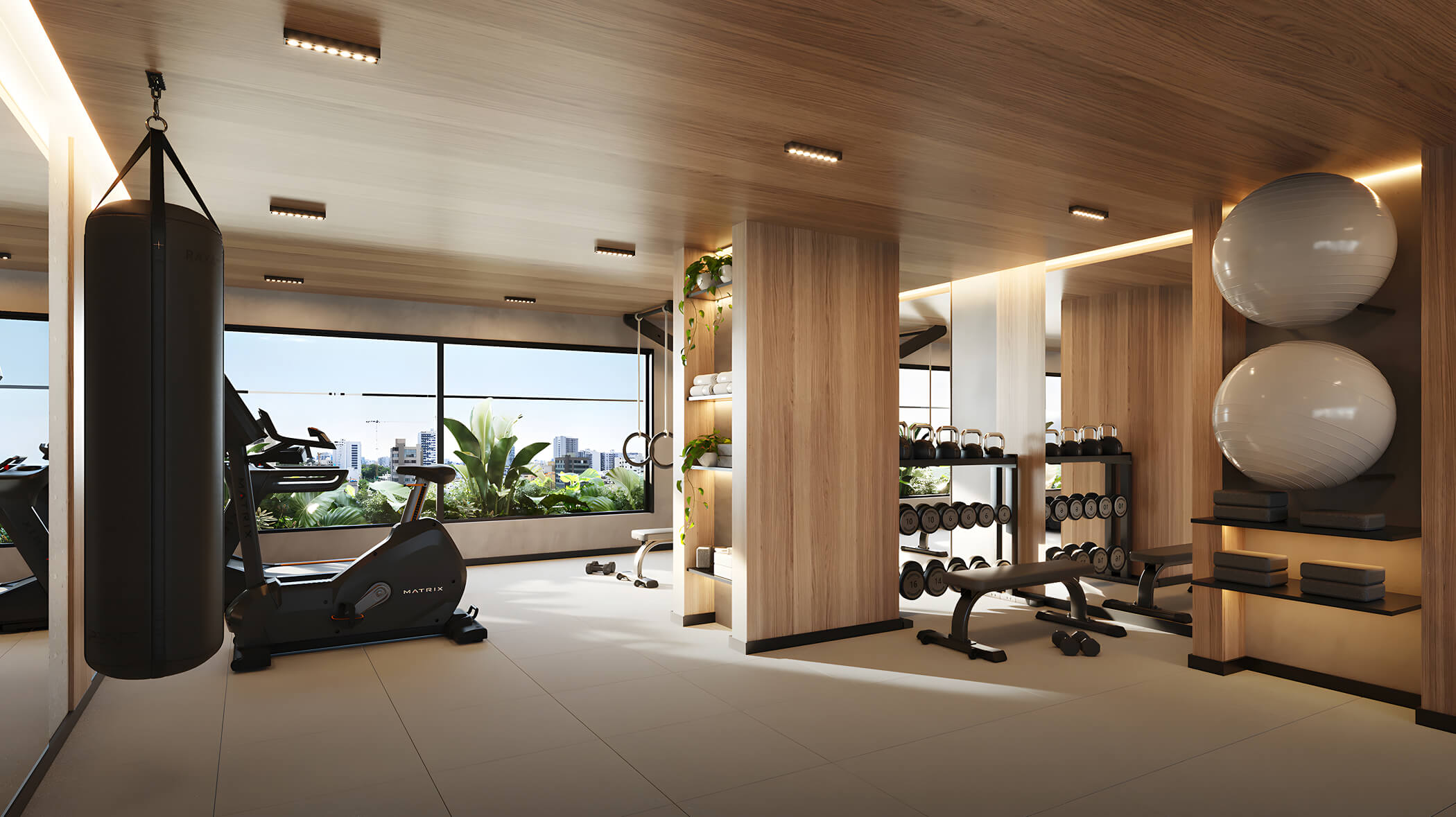 Gimnasio del proyecto Aster Costanera en San Miguel de Aster Homes con máquinas de cardio, área de pesas y acabados modernos.