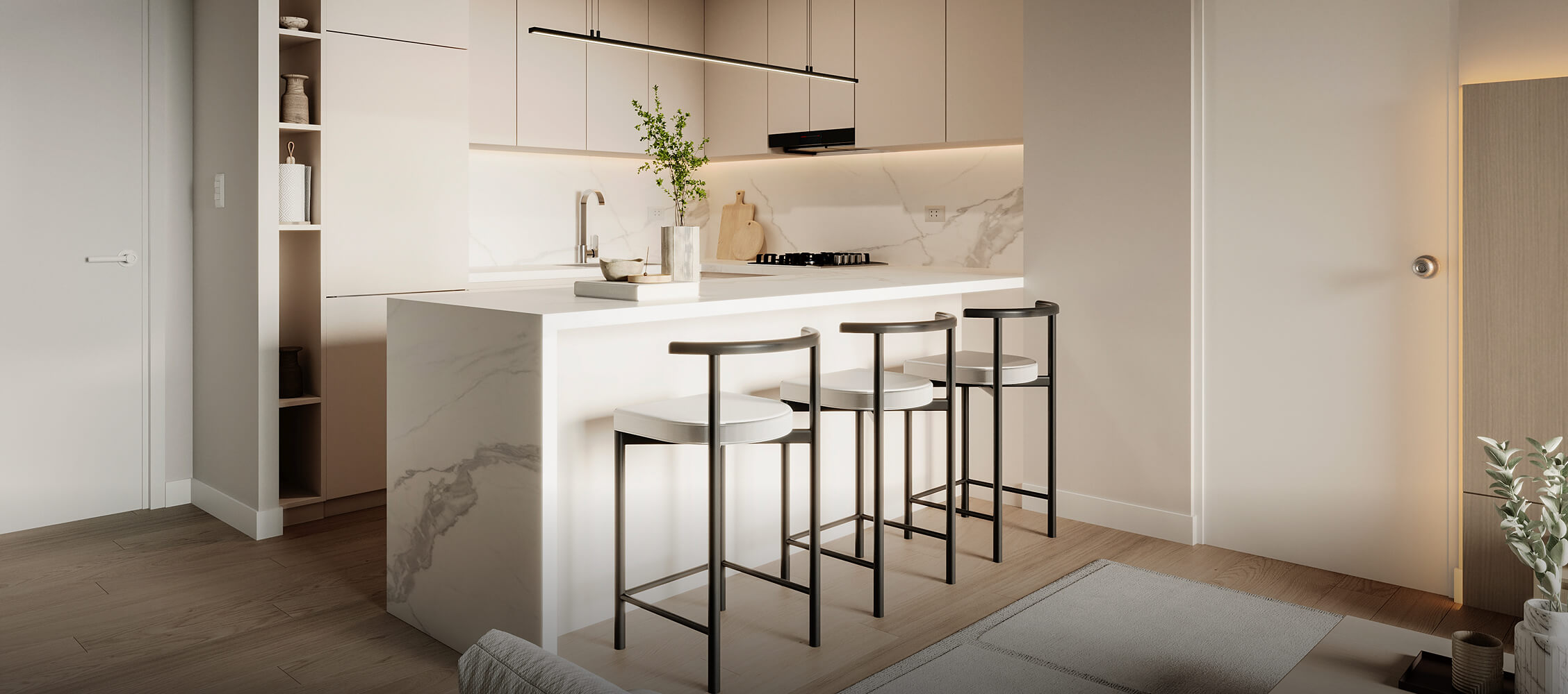 Barra del proyecto Basadre de Aster Homes con revestimientos en mármol, iluminación cálida y mobiliario de diseño.