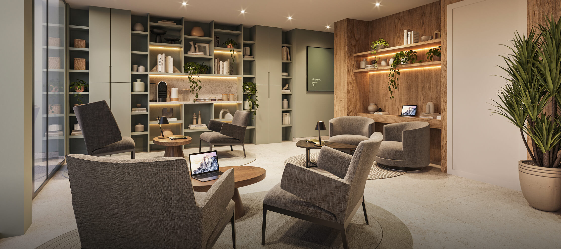 Coworking del proyecto Reducto Aster Homes en Miraflores con espacios de trabajo acogedores y estanterías integradas.